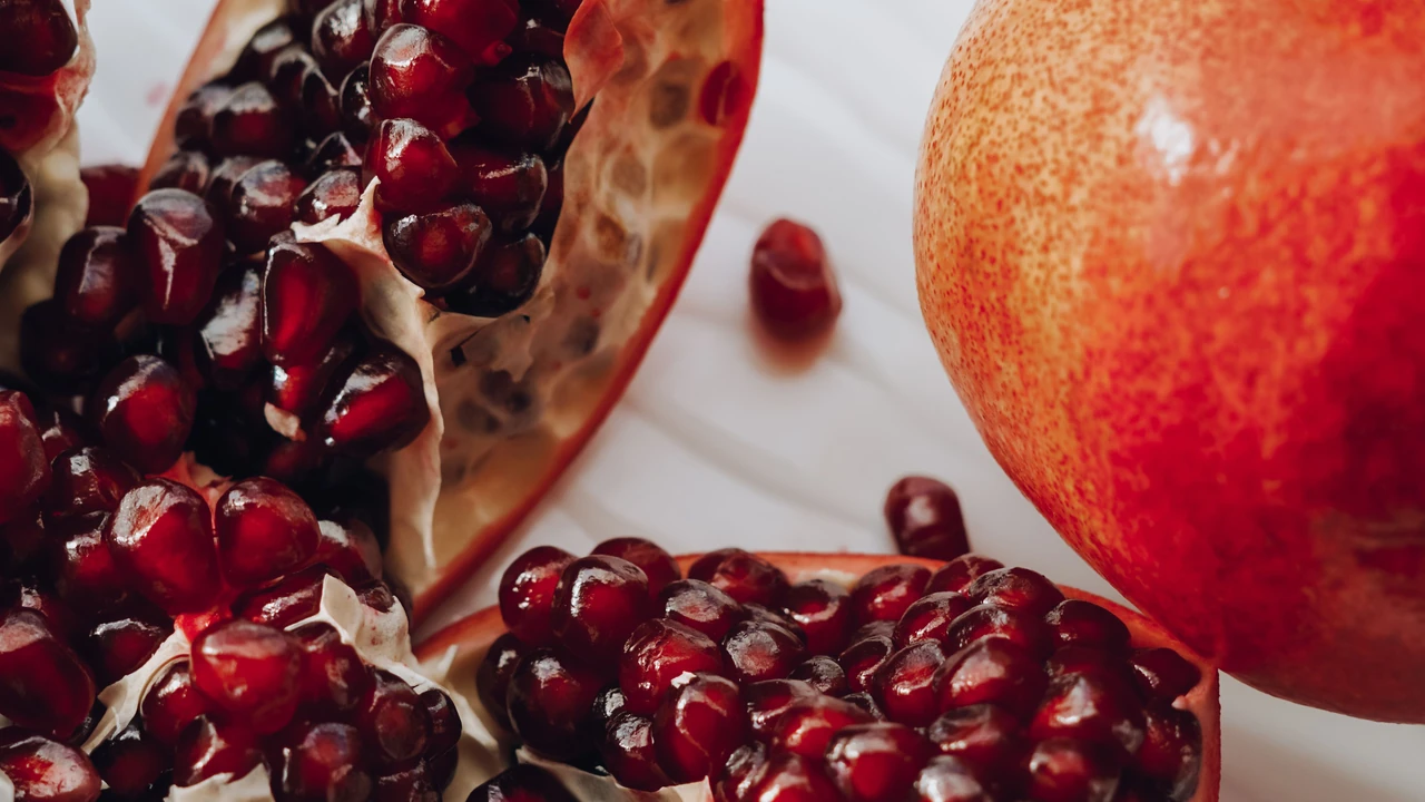 Nutrient-dense balanced diet featuring fresh pomegranate arils in wholesome salads