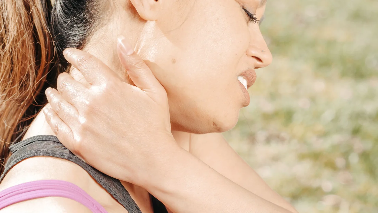 Targeted therapeutic soft tissue massage easing chronic neck, shoulder, and back physical discomfort and muscular soreness