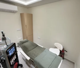 Sanitized clinical bed, Medi-facial equipment, and climate-controlled procedure room