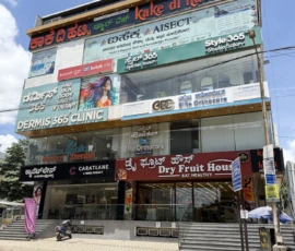 Dermis 365 Clinic facade and exterior sign at NDV Towers Bangalore